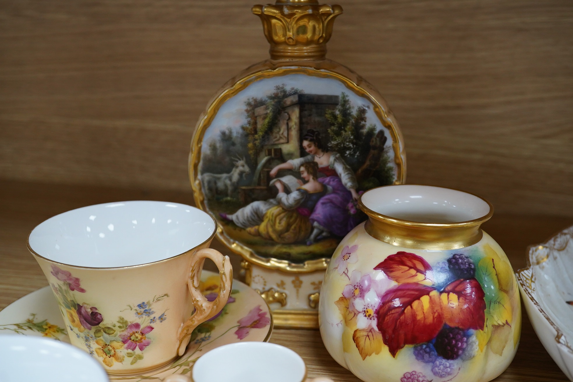 Royal Worcester including a Kitty Blake blackberry vase, a Berlin leaf dish, and a French painted moon flask, latter 21.5cm. Condition - fair to good